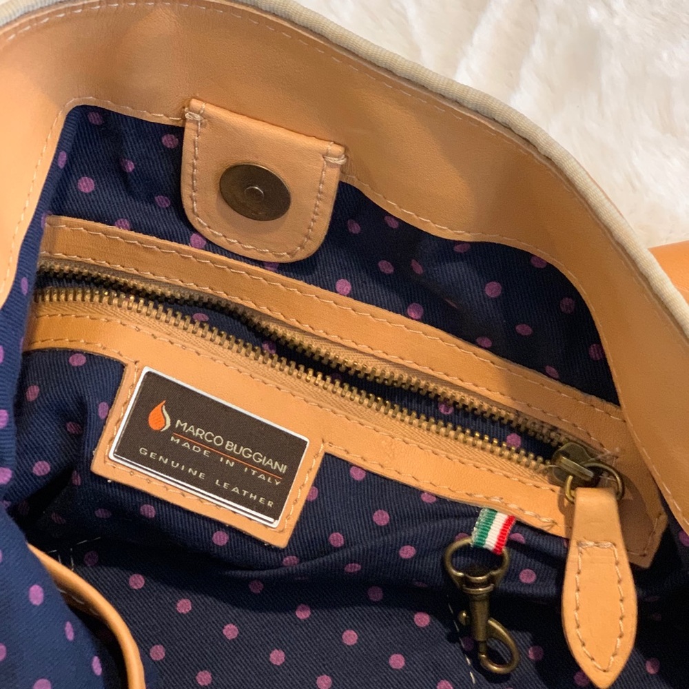 Large, leather Marco Buggiani purse.